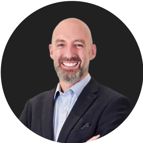 Smiling professional man in business suit representing leadership and expertise