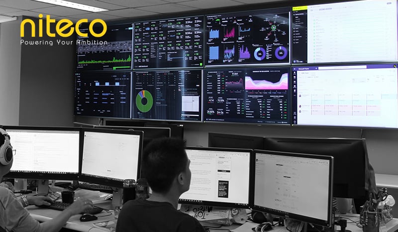 Niteco data dashboard and analytics monitored by IT professionals in control room