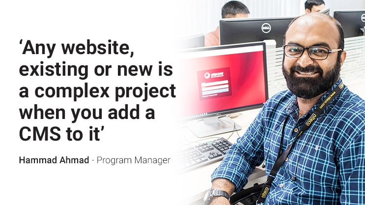 Man in office with quote on CMS complexity for website projects by Program Manager