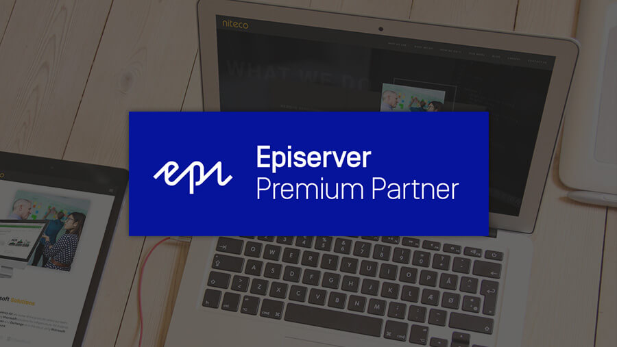 Optimizely Premium Partner logo on a laptop and tablet workspace background